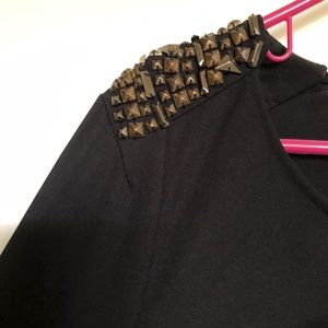 Black with bronze accents on shoulder